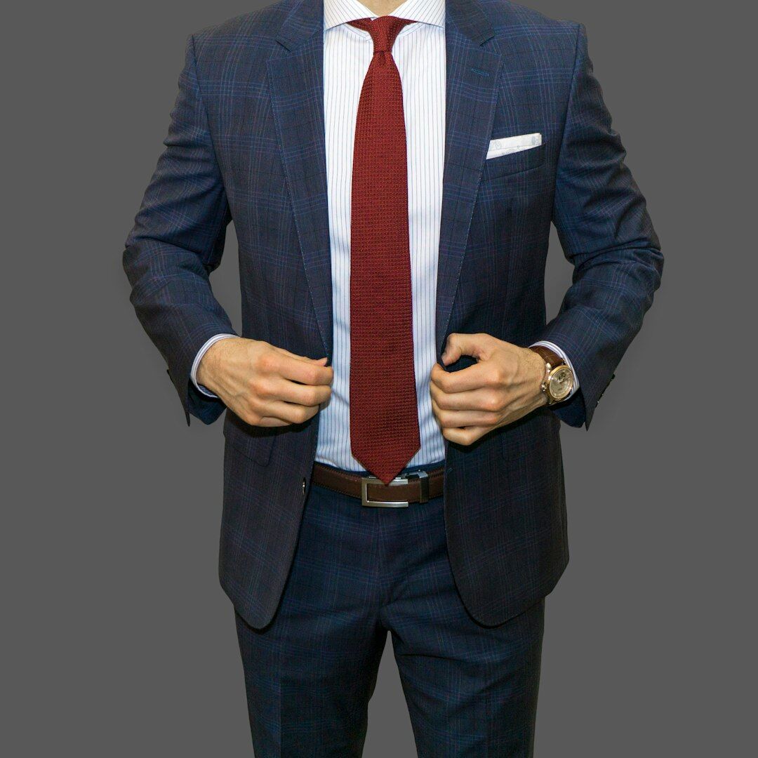 Professional male TV journalist trainer in business attire