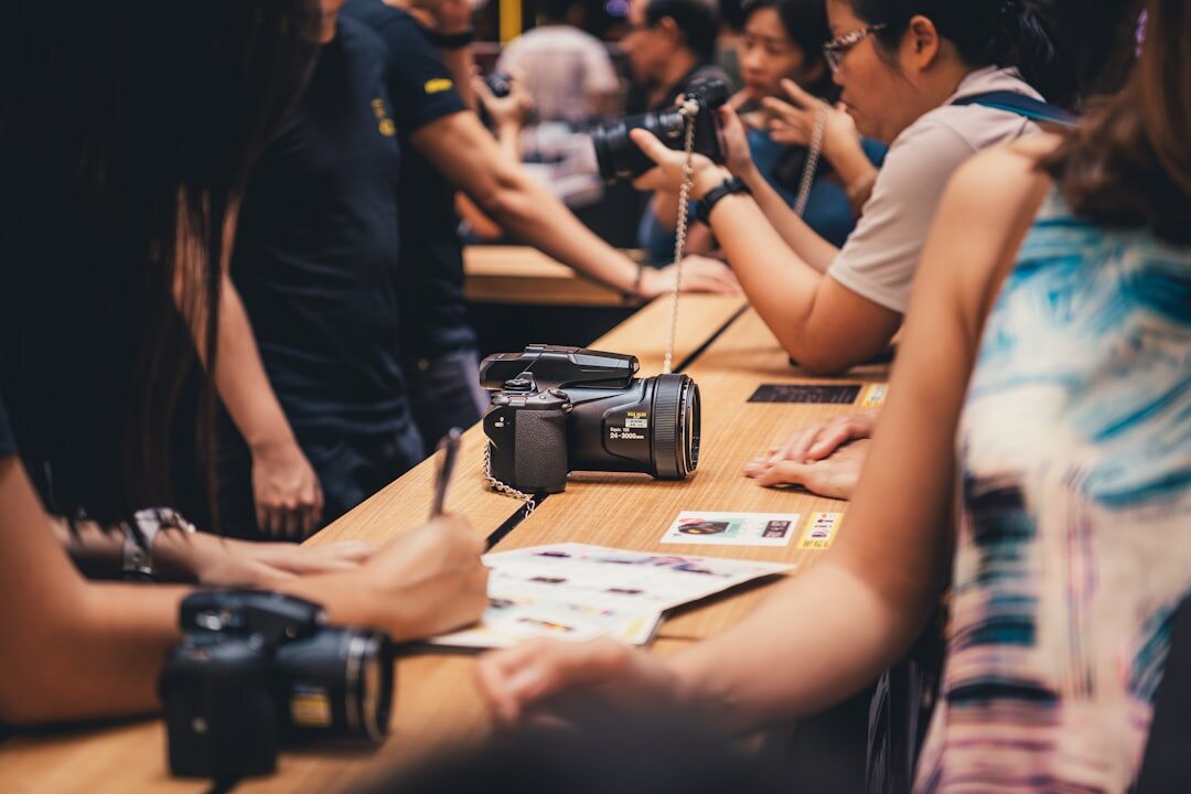 Group of journalism students engaged in a professional workshop